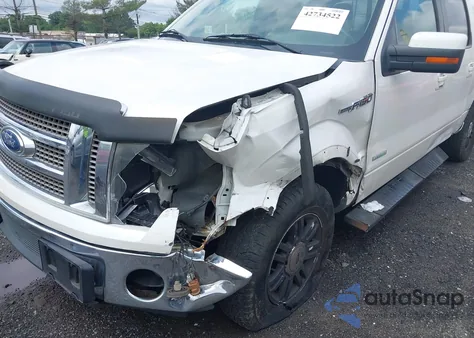 2011 Ford F-150 Lariat z USA, uszkodzony, nr VIN 1FTFW1ET0BFD35521